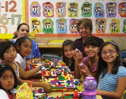 Children Building with Legos Together at Mini Center