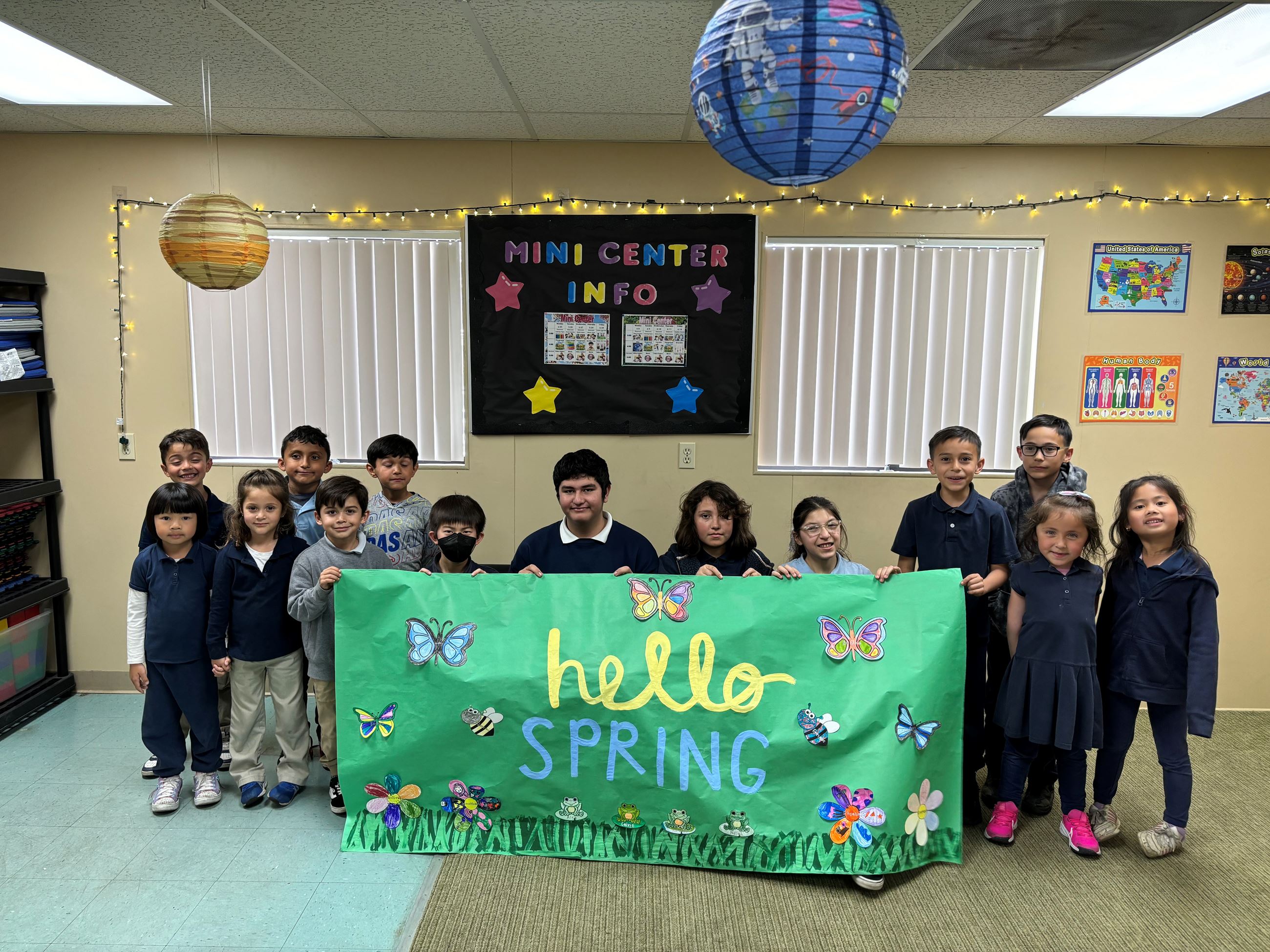 kids sitting at tables with food